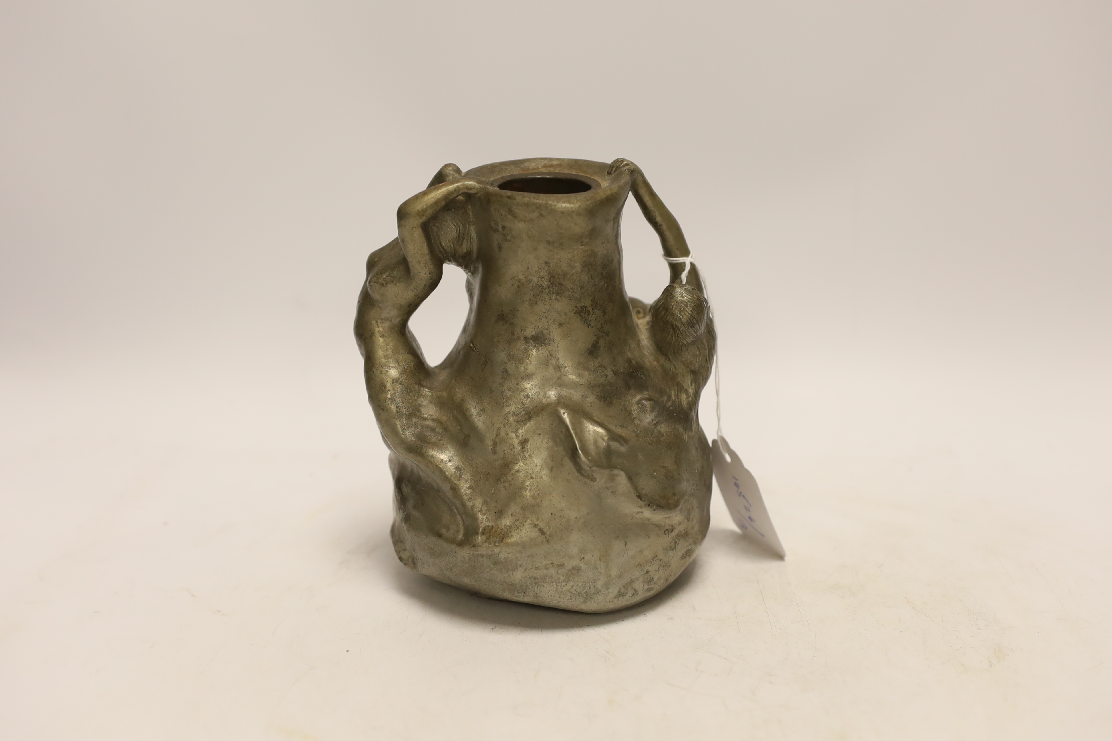 An Art Nouveau pewter 'psirens' vase, signed J. Garnier , 16cm high